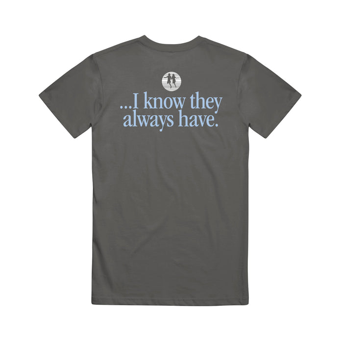 A dark gray cotton t-shirt from Rival Schools features light blue text on the back: "...I know they always have." Above it is a small white graphic of two trees in a circle, making this stylish printed tee comfortable to wear.