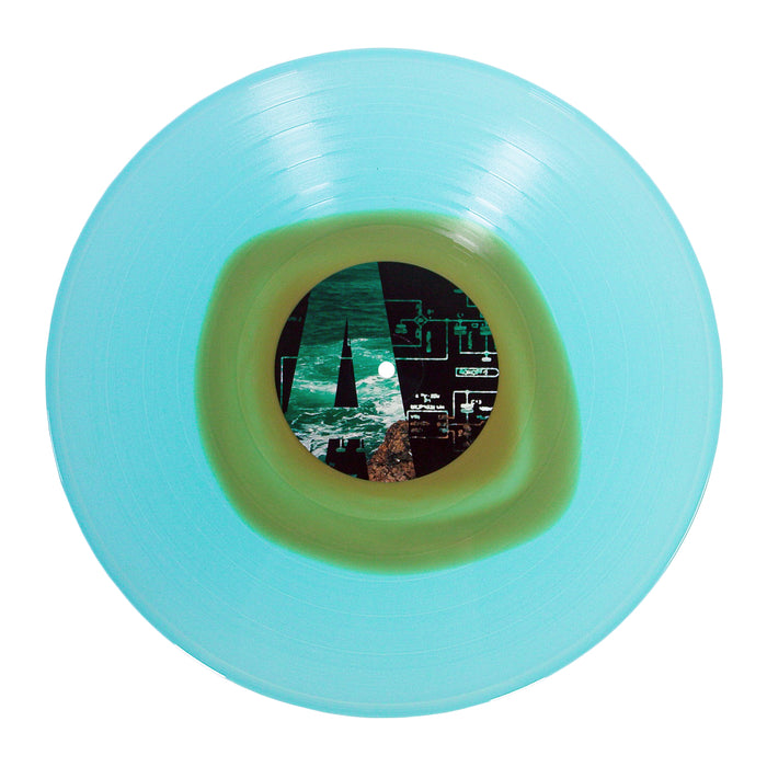 A translucent turquoise Joshua post-hardcore vinyl features an olive-green center label with ocean waves, a bold letter A, and dark technical diagrams.