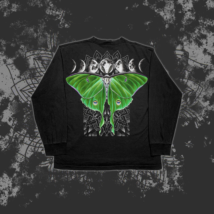 A Reflections long-sleeve shirt with a large green Luna moth, geometric patterns, and lunar phases printed on the back over a textured abstract background.