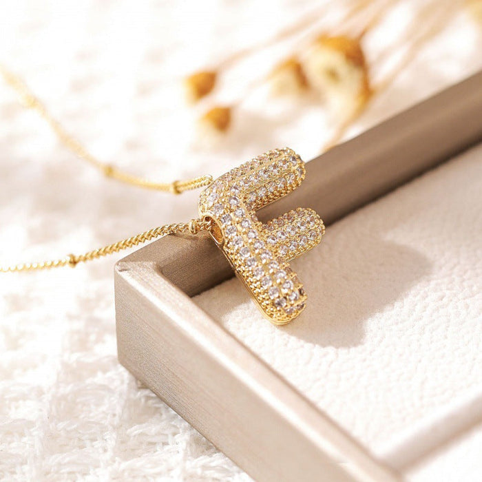 Gold / F