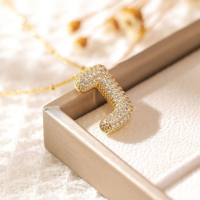 Gold / J