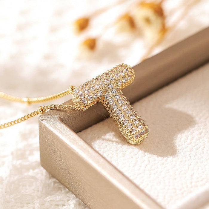 Gold / T