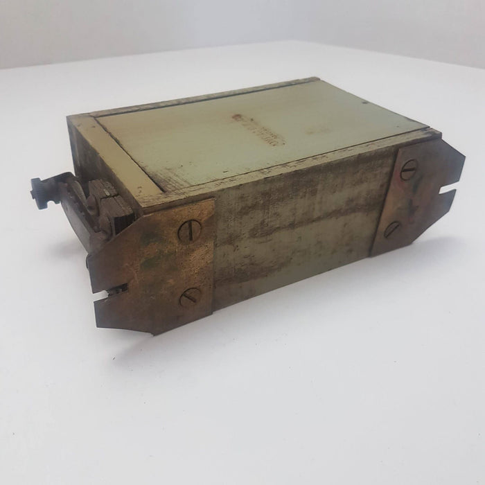 Antique Pontiac wooden T coil with embossed Pontiac Coil Co., Michigan.