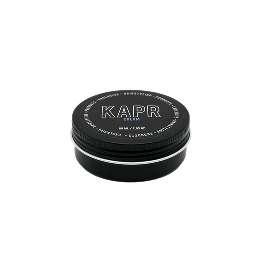 KAPR Cream – zwarte hairstyling cream pot met wit logo op transparante achtergrond.