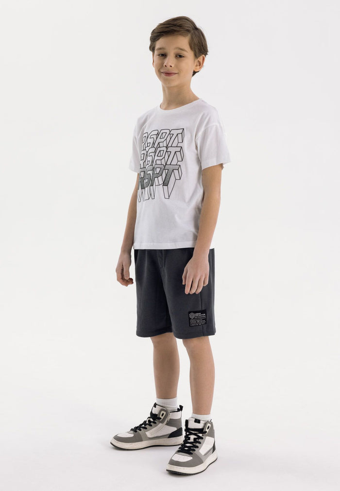 Boys grey fleece shorts with ribbed side panels, front view, featuring two side pockets and a decorative patch.