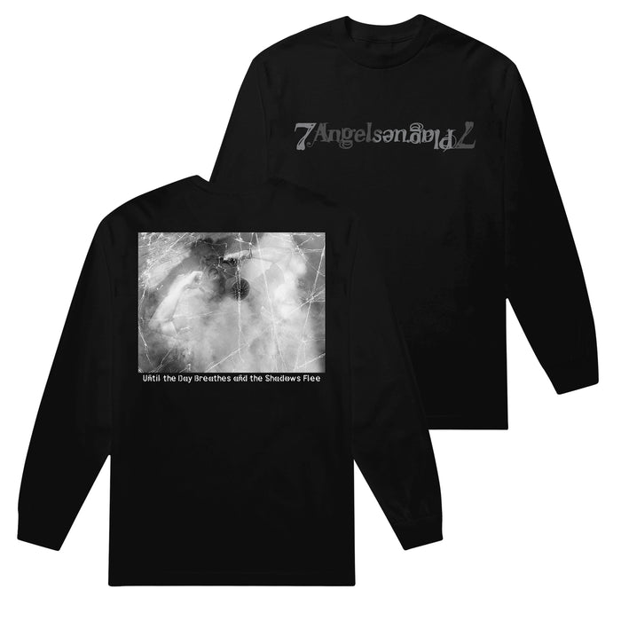 A black long-sleeve 7 Angels 7 Plagues shirt (Style: 1304) with the band name in a stylized font on the front, and a grayscale abstract image plus "Until the Day Breathes and the Shadows Flee" text on the back.