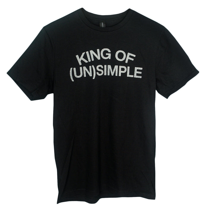 A black Matt Nathanson t-shirt featuring "KING OF (UN)SIMPLE" in bold white letters on the chest, styled in a modern classic fit and made from soft ring-spun cotton.