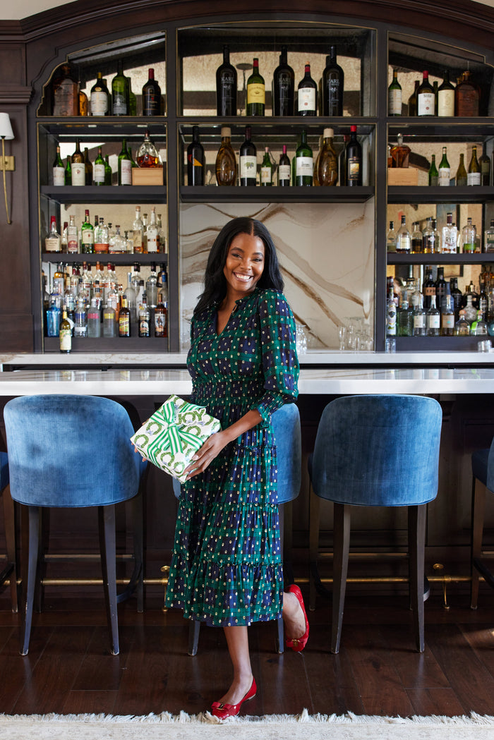 Indoor model in the Sail to Sable Smocked Waist Midi Dress - Blackwatch Plaid