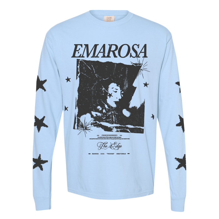 Light blue Emarosa Comfort Colors long-sleeve t-shirt featuring black stars on the sleeves, "EMAROSA" on the front above a black-and-white person image, and additional text including “The Edge.”.