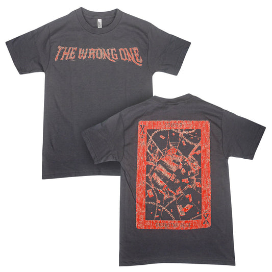 Black T-shirt crafted from premium U.S. cotton with a relaxed fit by Sorry X. “THE WRONG ONE” is emblazoned in bold red text across the front, while the back features a large, abstract shattered graphic framed in vibrant red.