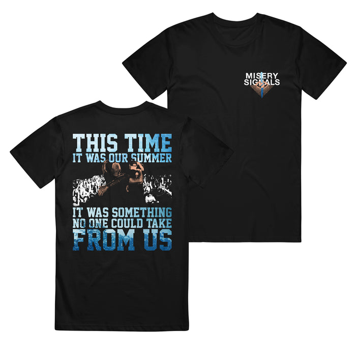 Misery Signals black relaxed-fit t-shirt made from 100% cotton. Features a small left chest Misery Signals logo and a back print with a large crowd image and blue & white text: "This time it was our summer, it was something no one could take from us.